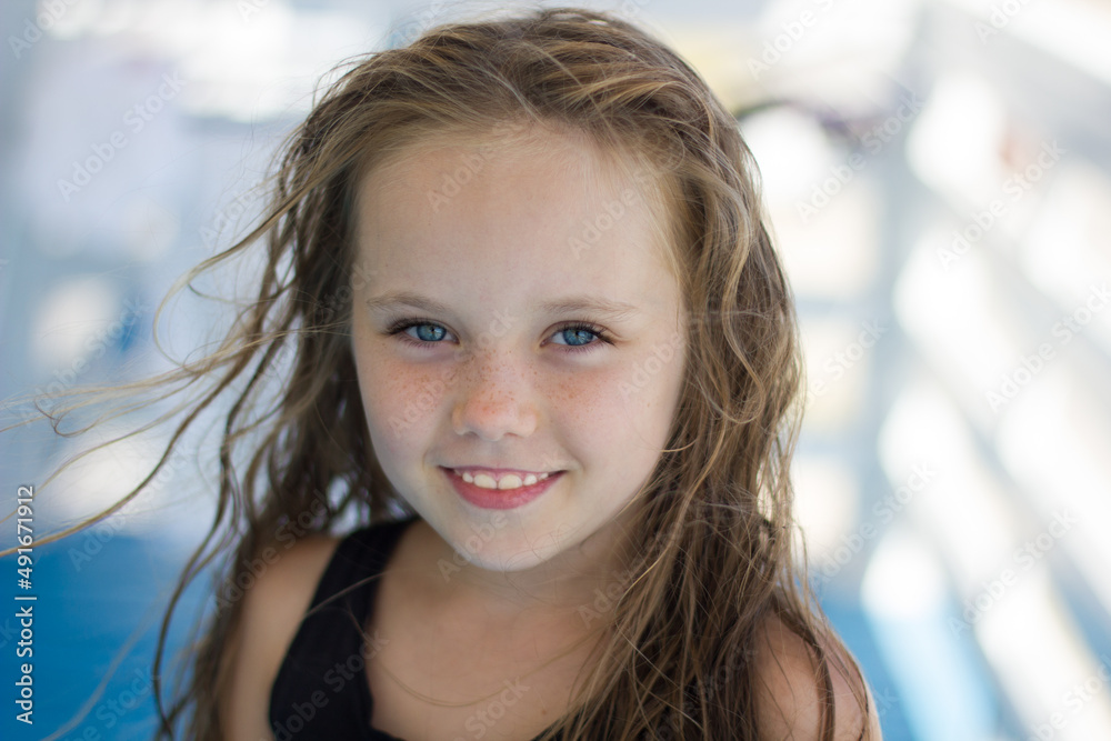 Girl with blue eyes looking at the camera Girl with blue eyes looking at the camera