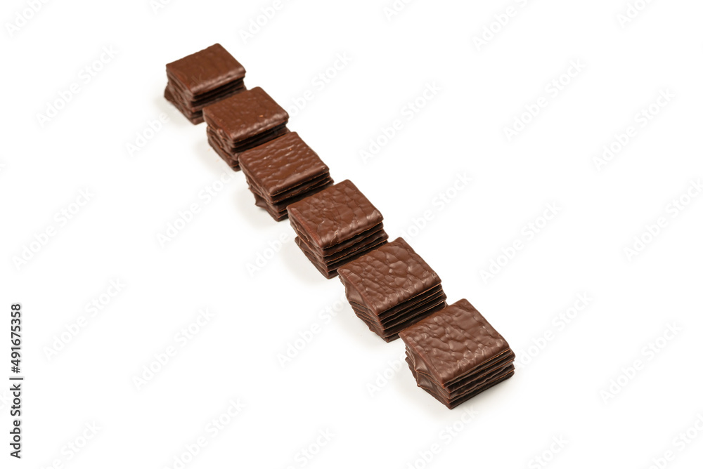 Dark chocolate candies isolated on white background. Dark chocolate candies isolated on white background.
