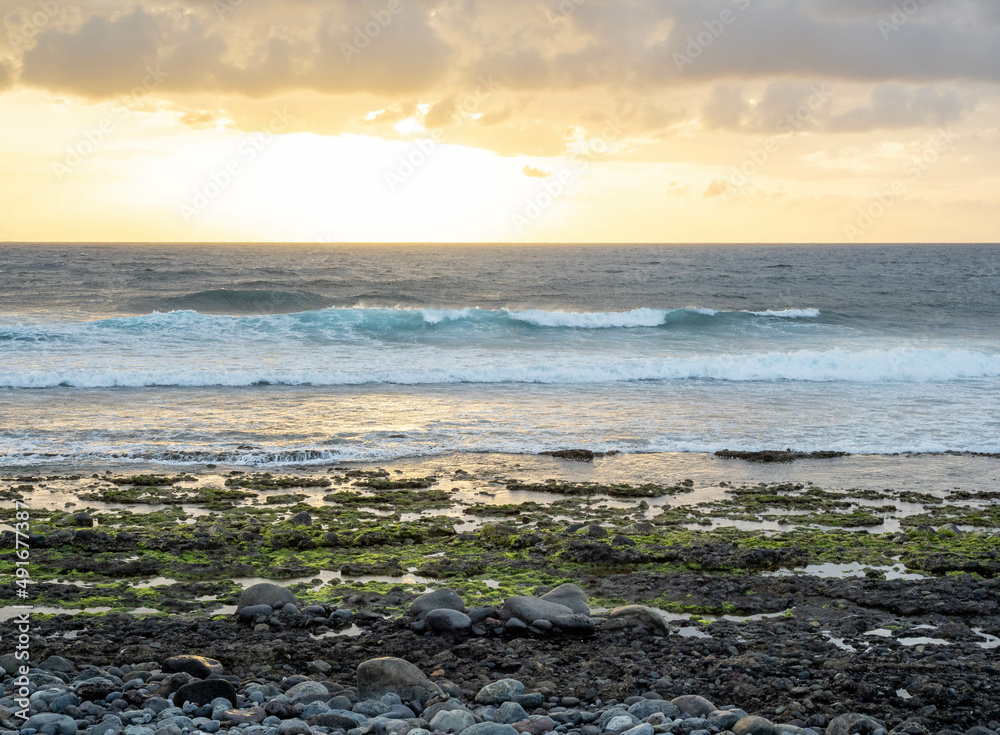 Coast of Gran Canaria close to salines of Tenefe at sunrise, Canary islands, Spain Coast of Gran Canaria close to salines of Tenefe at sunrise, Canary islands, Spain