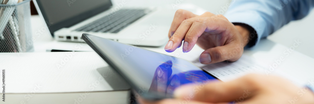 Business investor executive using laptop analyzing value of stock market exchange. Investment planing Business investor executive using laptop analyzing value of stock market exchange. Investment planing