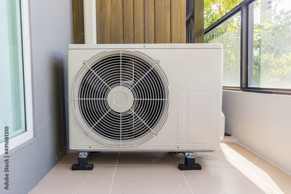 Fototapeta premium Air condition outdoor unit compressor install outside the house