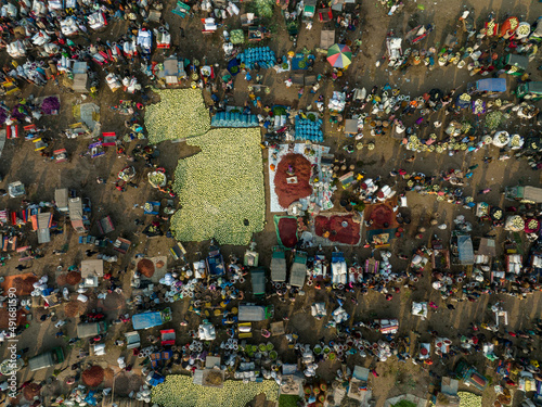 Aerial view of people in a food market in Shibganj, Rajshahi state, Bangladesh. photo