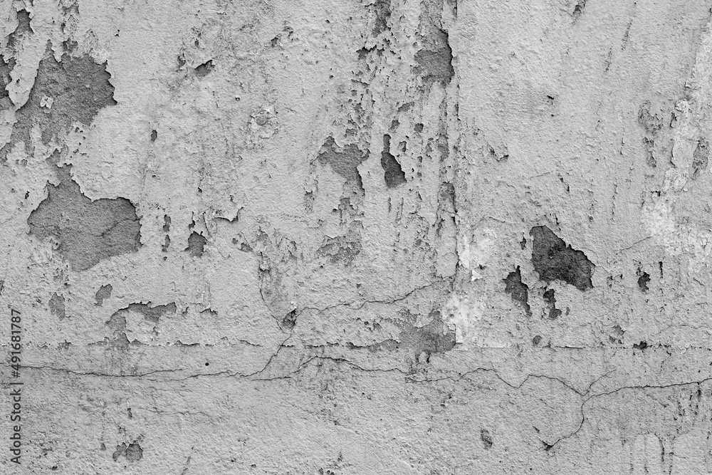 Obraz premium Abandoned rustic concrete wall with cracks for texture