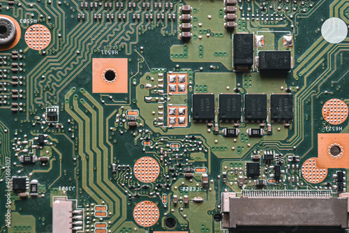 Electronic circuit board close up.