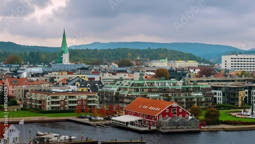 Kristiansand, Norway. Aerial view of the city. Time-lapse during the cloudy day in autumn of Kristiansand, Norway, zoom in