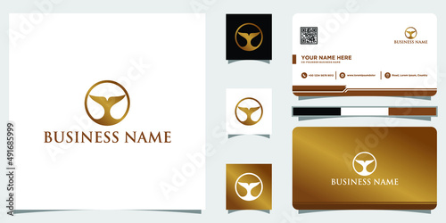 Abstract whale tail logo in gold luxury style and business card design template