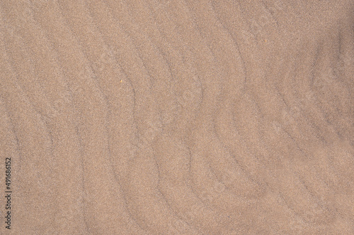 Beach sand background with ripples