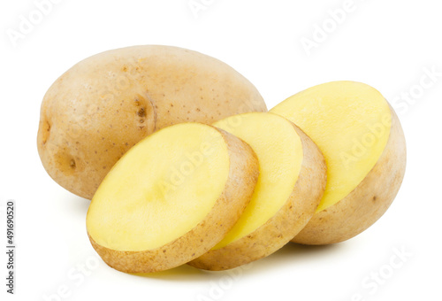 Potatoes and sliced potato wedges isolated on white background. Fresh vegetables.