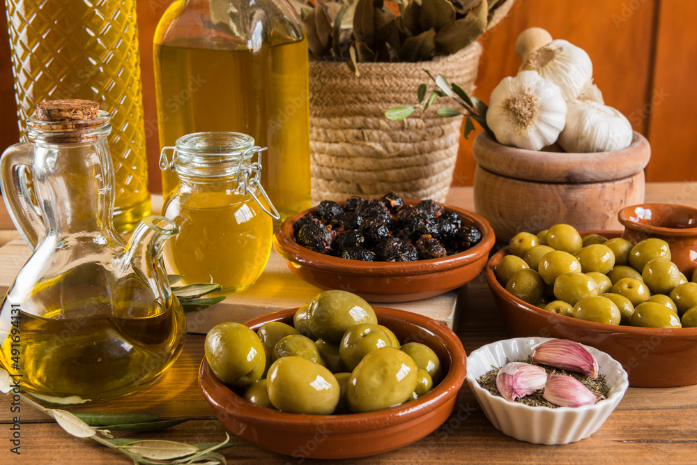 Still life with olives and extra virgin olive oil. Still life with olives and extra virgin olive oil.