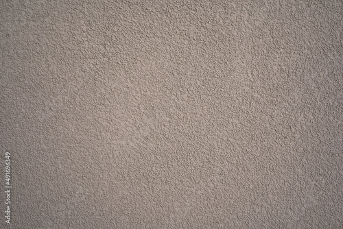 photo of grey-beige stucco on a plain wall for texture