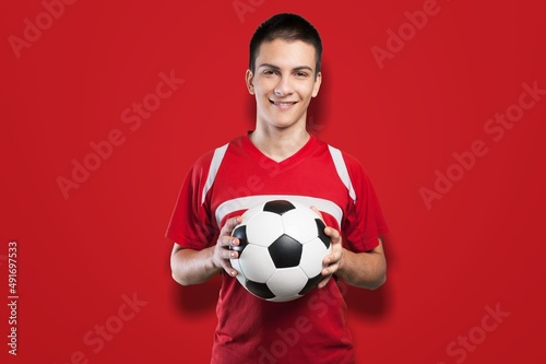Happy young man football fan in t-shirt cheer up support favorite team hold soccer ball © BillionPhotos.com