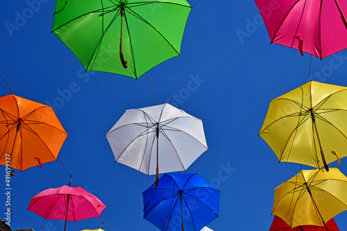 Les Andelys  France - july 2 2019   umbrellas in a street