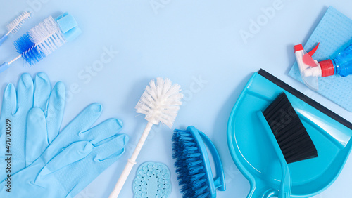 Zero waste cleaning tools composition on pastel blue background with copy space. Flat lay