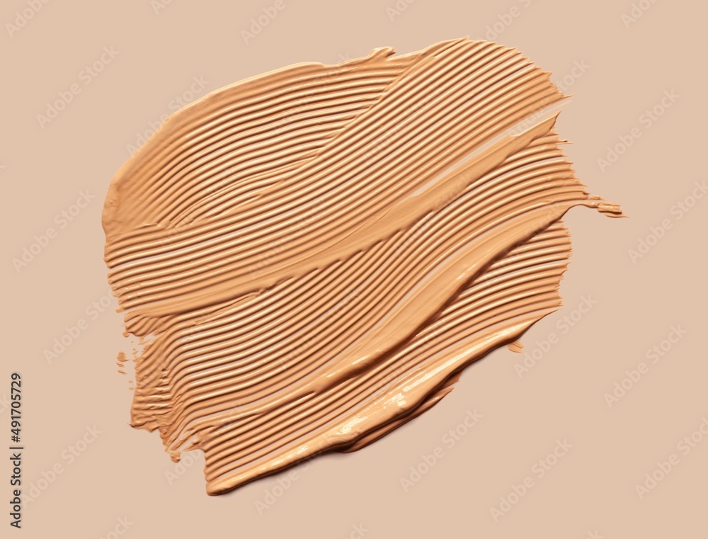 Make up smear foundation drops smudge texture beige isolated background Make up smear foundation drops smudge texture beige isolated background