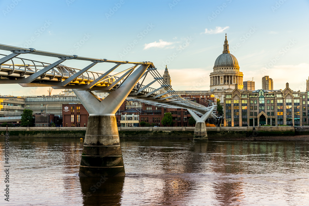 St Paul's Cathedral and the Millennium Bridge in London in the morning