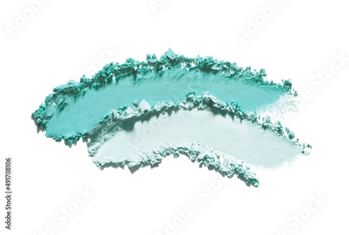 Eye shadow glitter shimmer and matte blue green colored texture background white isolated