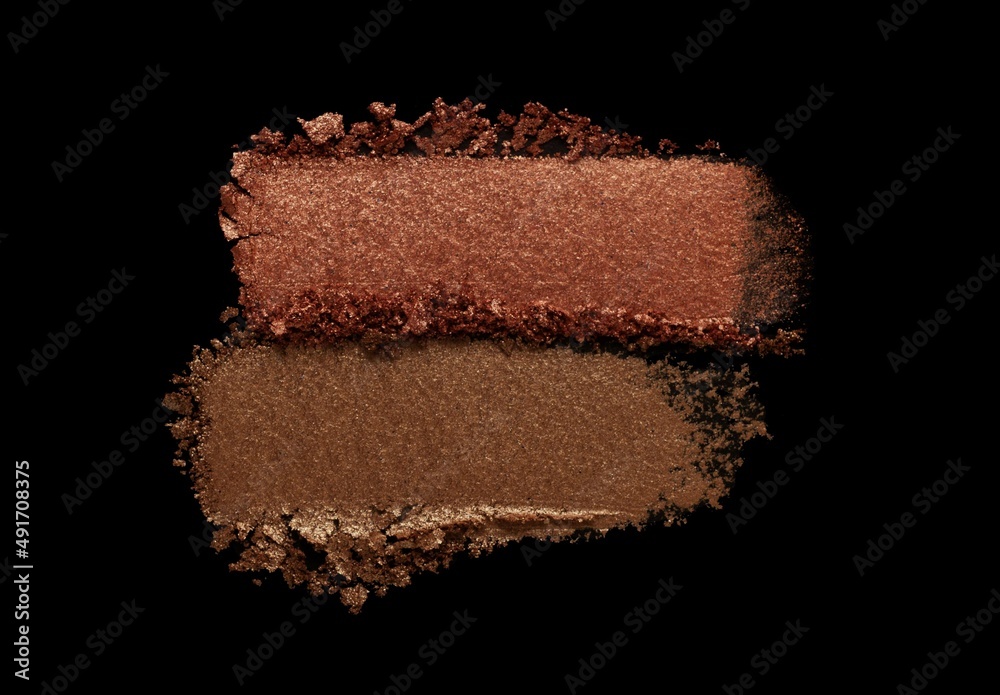 Eye shadow glitter shimmer and matte brown chocolat colored texture background black isolated Eye shadow glitter shimmer and matte brown chocolat colored texture background black isolated