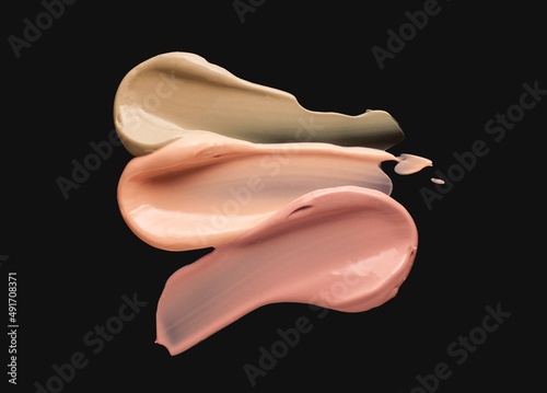 Liquid makeup foundation, bb, cc cream isolated on black background