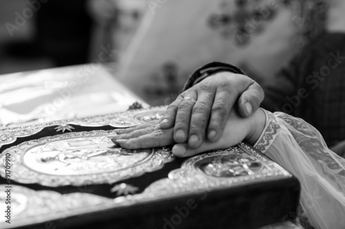 Wedding ceremony in the church. Hands of the bride and groom. wedding traditions