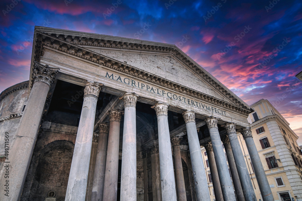 The Pantheon in Rome, Italy under a dramatic sky.