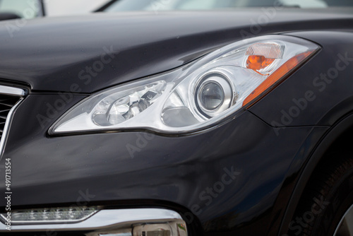 Headlight of a modern prestigious car close-up with modern optics