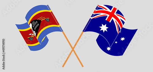 Crossed and waving flags of Australia and Eswatini
