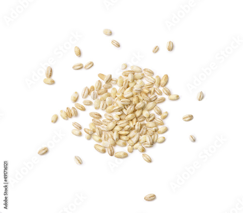 barley groats scattered on a white background photo