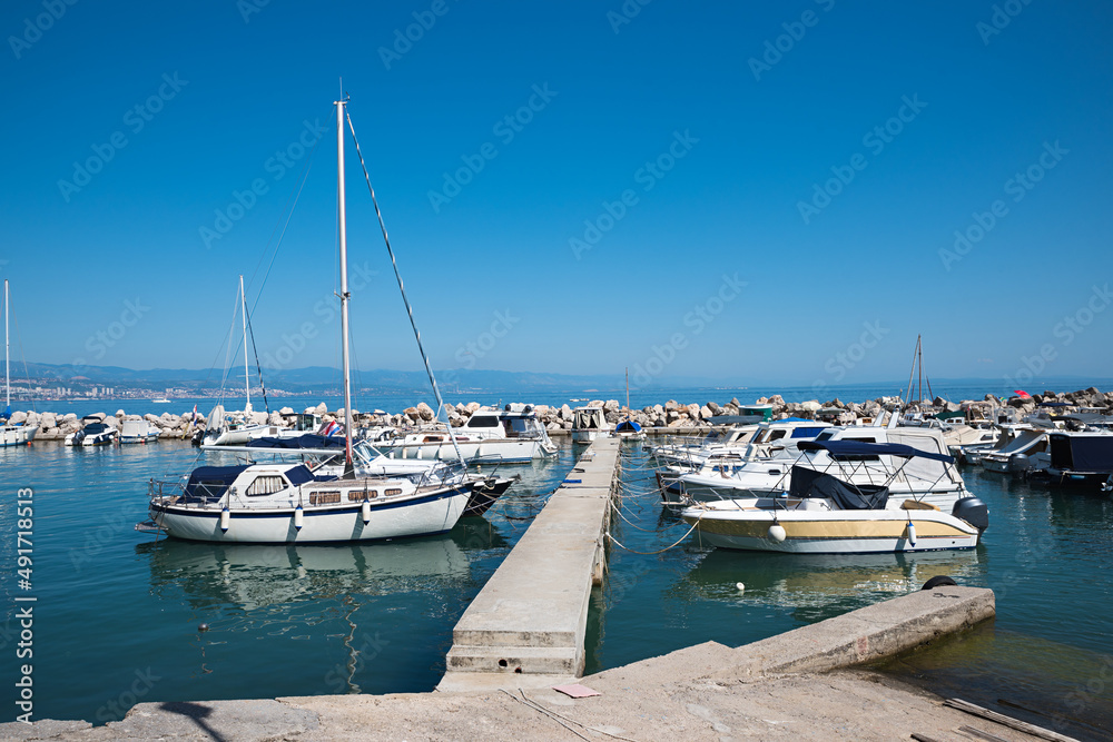 harbor Icici with lots of motorboats and sailboats, croatian coast near Opatija