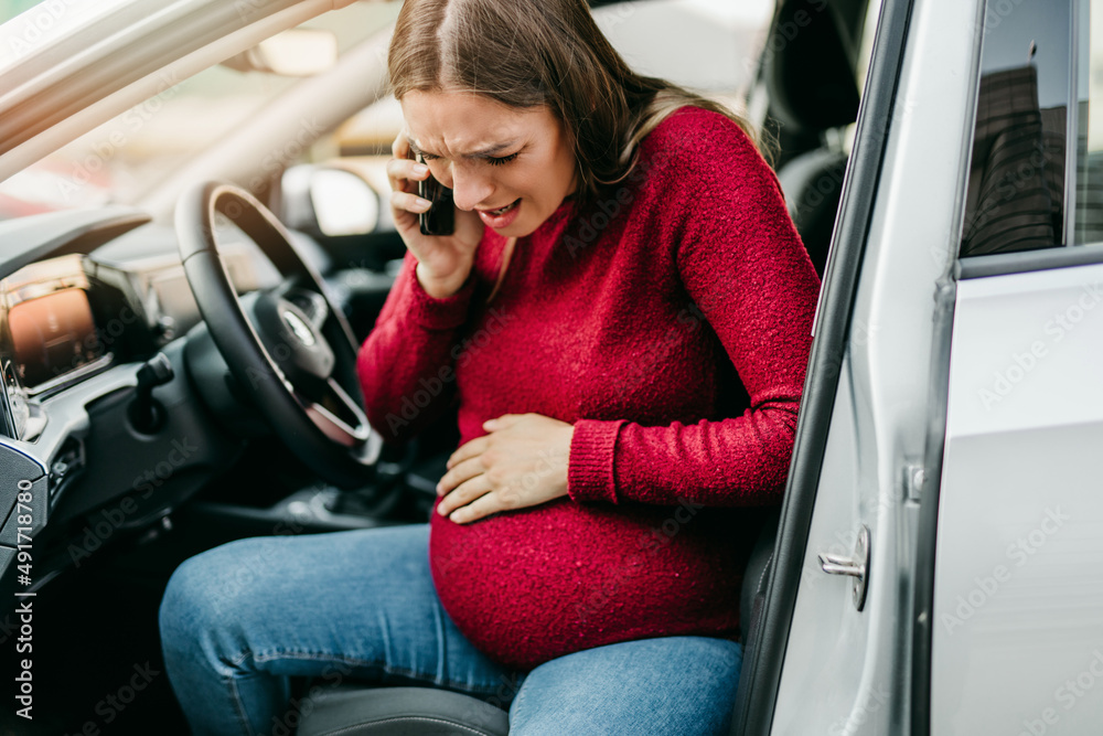 Pregnant Woman Starting To Feel Pain And Contractions Driving A Car ...