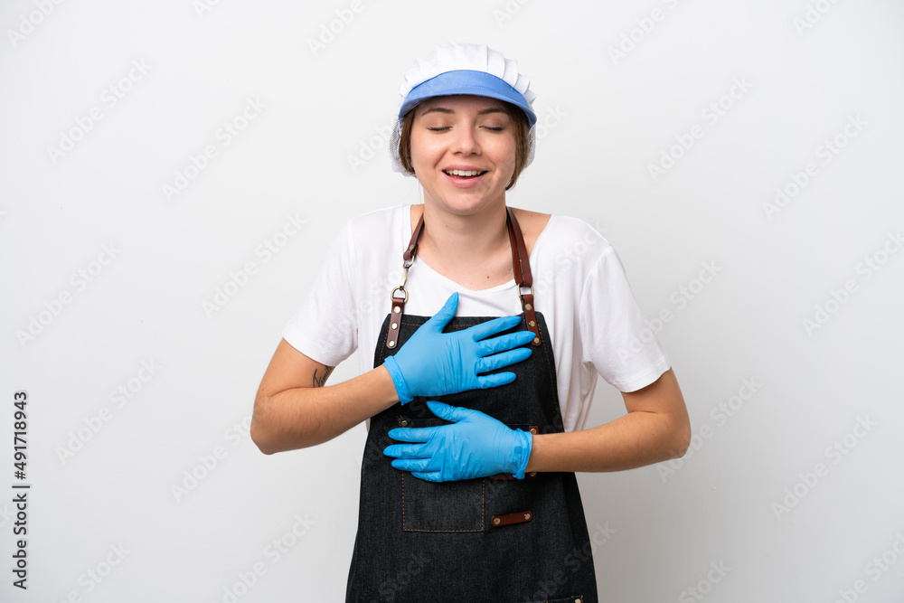 Fishmonger woman wearing an apron smiling a lot Fishmonger woman wearing an apron smiling a lot
