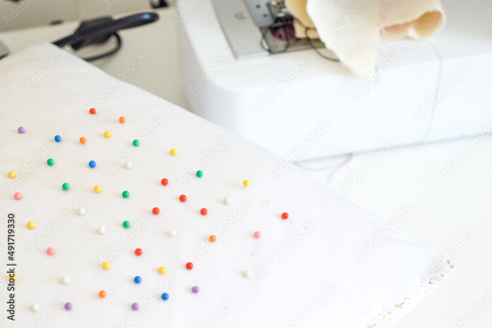 Sewing machine and pin cushion in home interior