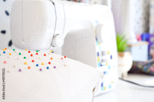 Sewing machine and pin cushion in home interior