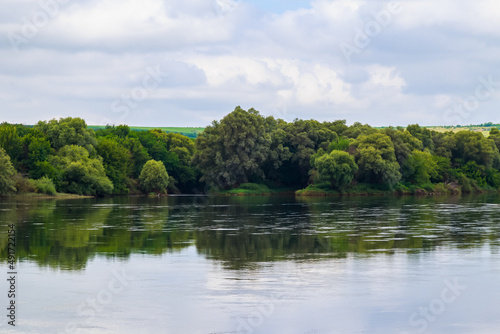 Wide river. Eastern european background with copy space for text or lettering. Ideal for fishing and rafting. photo