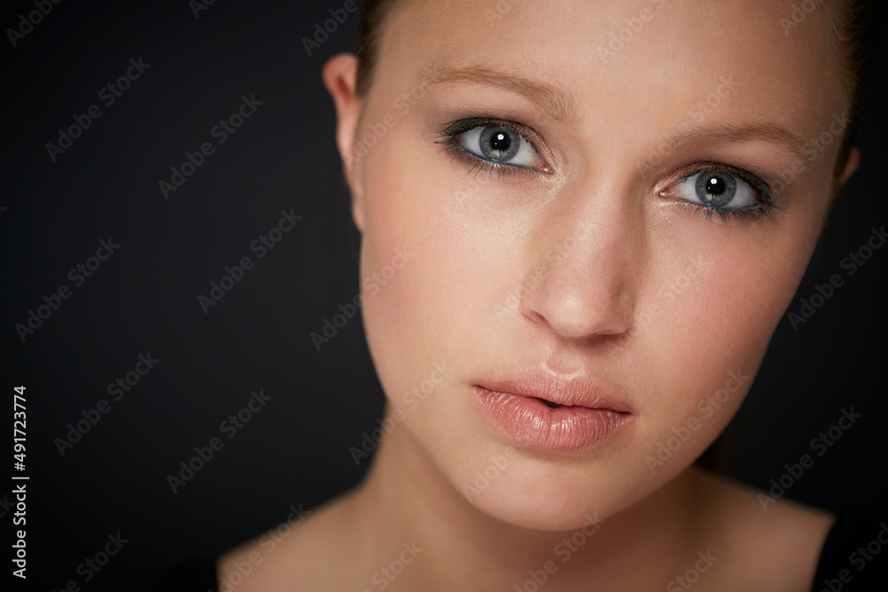 Incredible beauty. Closeup studio portrait of a young woman with perfect skin.