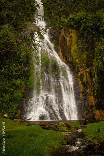 Beautiful photo of a waterfall in the jungle  tropical forest  river. away from the waterfall. Colombia