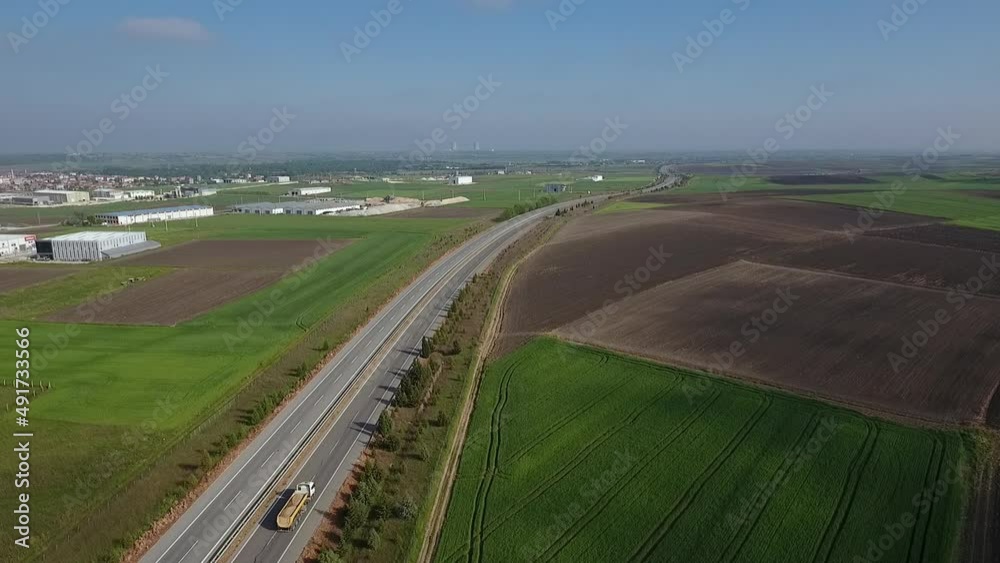 Flight over the field and road Flight over the field and road