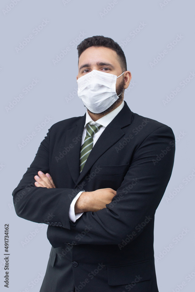 isolated businessman using mask to protect himself from viruses isolated businessman using mask to protect himself from viruses