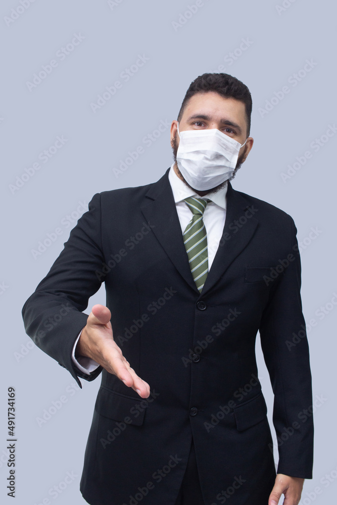 isolated businessman using mask to protect himself from viruses isolated businessman using mask to protect himself from viruses