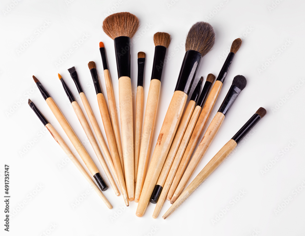 Brush away your flaws. An isolated shot of s set of makeup brushes. Brush away your flaws. An isolated shot of s set of makeup brushes.