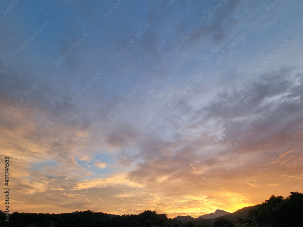 Vanilla sky and evening countryside