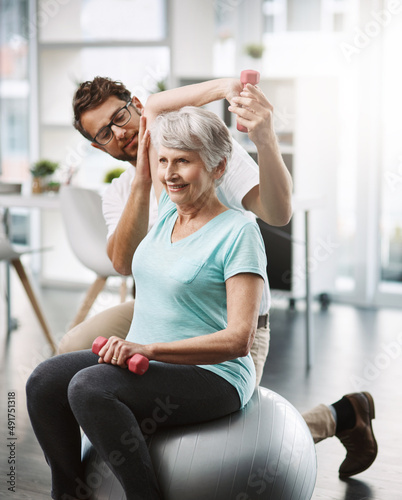 This shoulder is looking strong. Cropped shot of a young male physiotherapist working with a senior female patient.