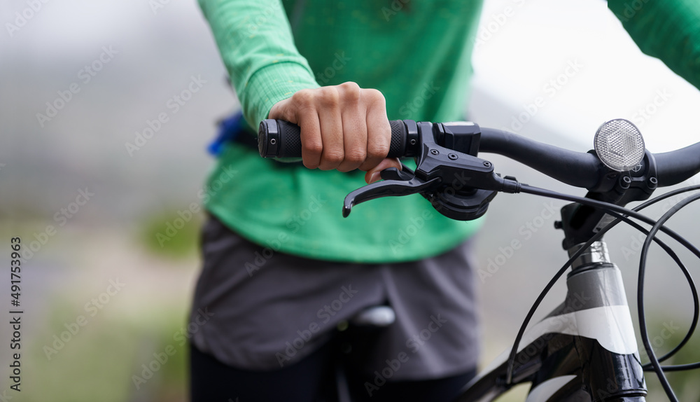 Ready for an exhilarating ride. Cropped shot of a cyclist on a mountain bike in the outdoors. Ready for an exhilarating ride. Cropped shot of a cyclist on a mountain bike in the outdoors.
