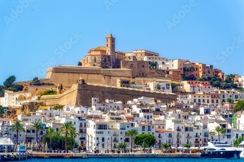 A sea side view to the Ibiza Old Town with Cathedral of Santa Maria d`Eivissa at the top of the hill in Ibiza, Spain. photo