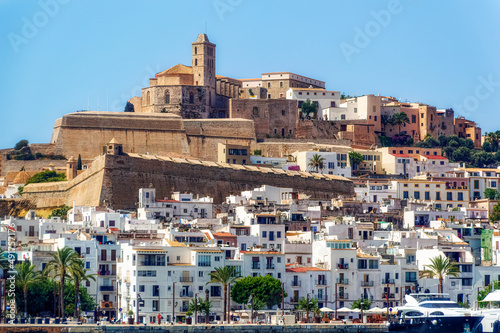 A sea side view to the Ibiza Old Town with Cathedral of Santa Maria d`Eivissa at the top of the hill in Ibiza, Spain.
