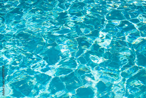 Water in swimming pool  background with high resolution. Wave abstract or rippled water texture.