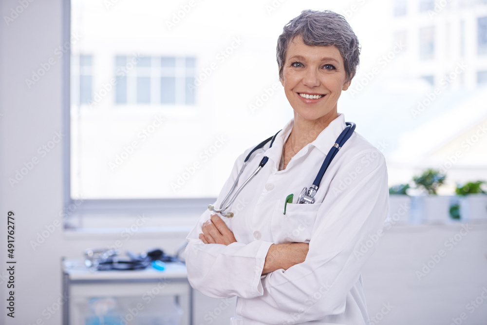 Her medical practice is well organised. Shot of a female doctor standing in a room with her arms crossed. Her medical practice is well organised. Shot of a female doctor standing in a room with her arms crossed.