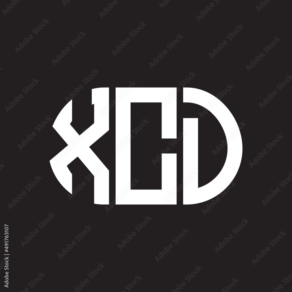 Fototapeta premium XCD letter logo design. XCD monogram initials letter logo concept. XCD letter design in black background.
