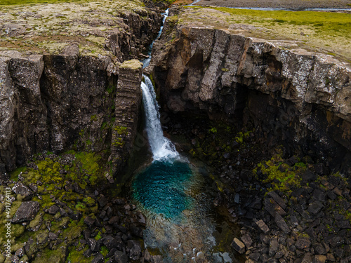 Beautiful aerial view of the magnificent Folaldafoss waterfall in the highlands of Iceland photo
