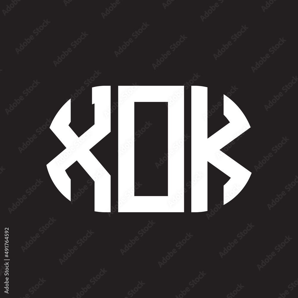 Obraz premium XOK letter logo design. XOK monogram initials letter logo concept. XOK letter design in black background.