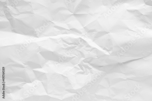 White crumpled paper texture background.